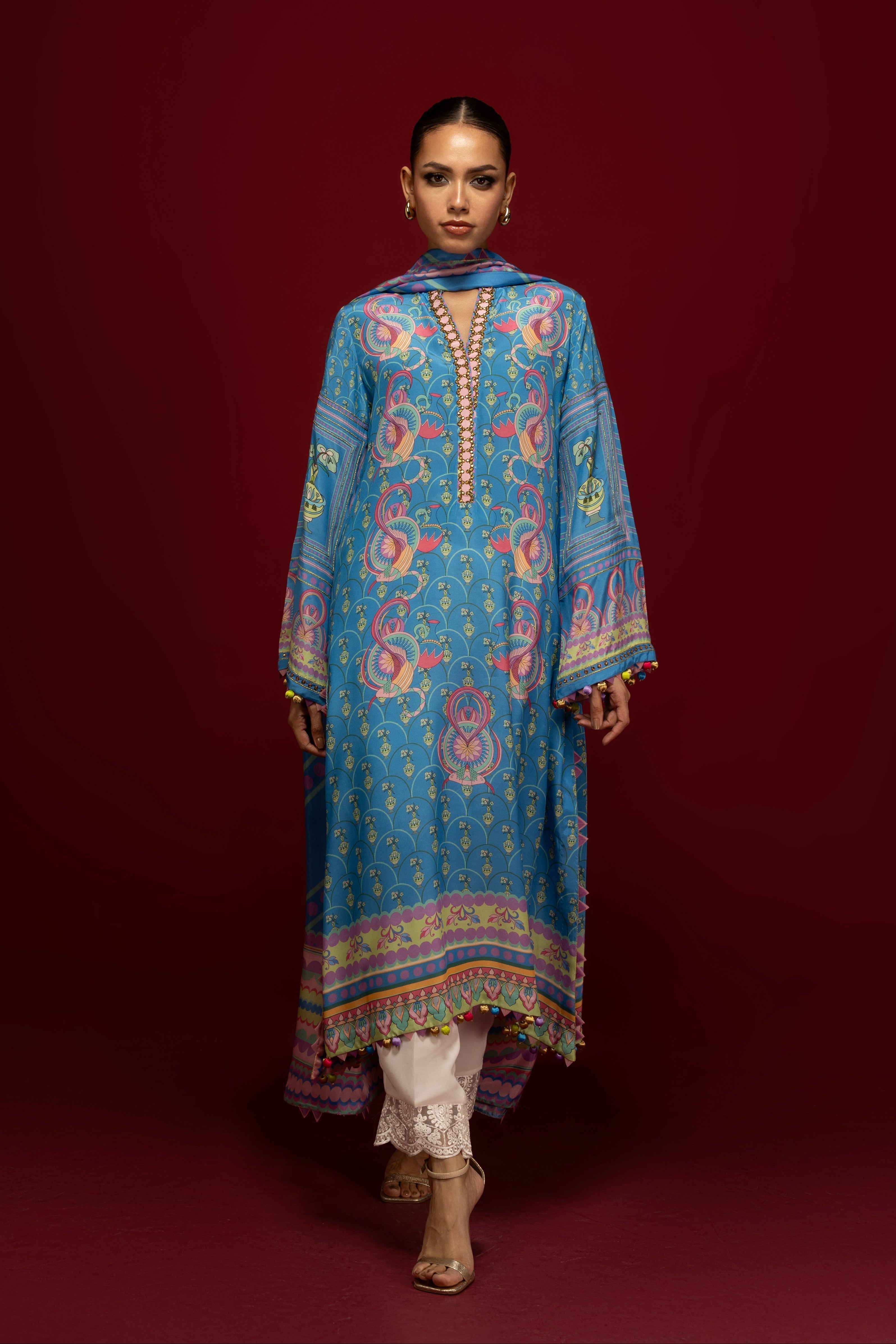 Cerulean blue printed Pakistani suit — a versatile piece styled across three different events
