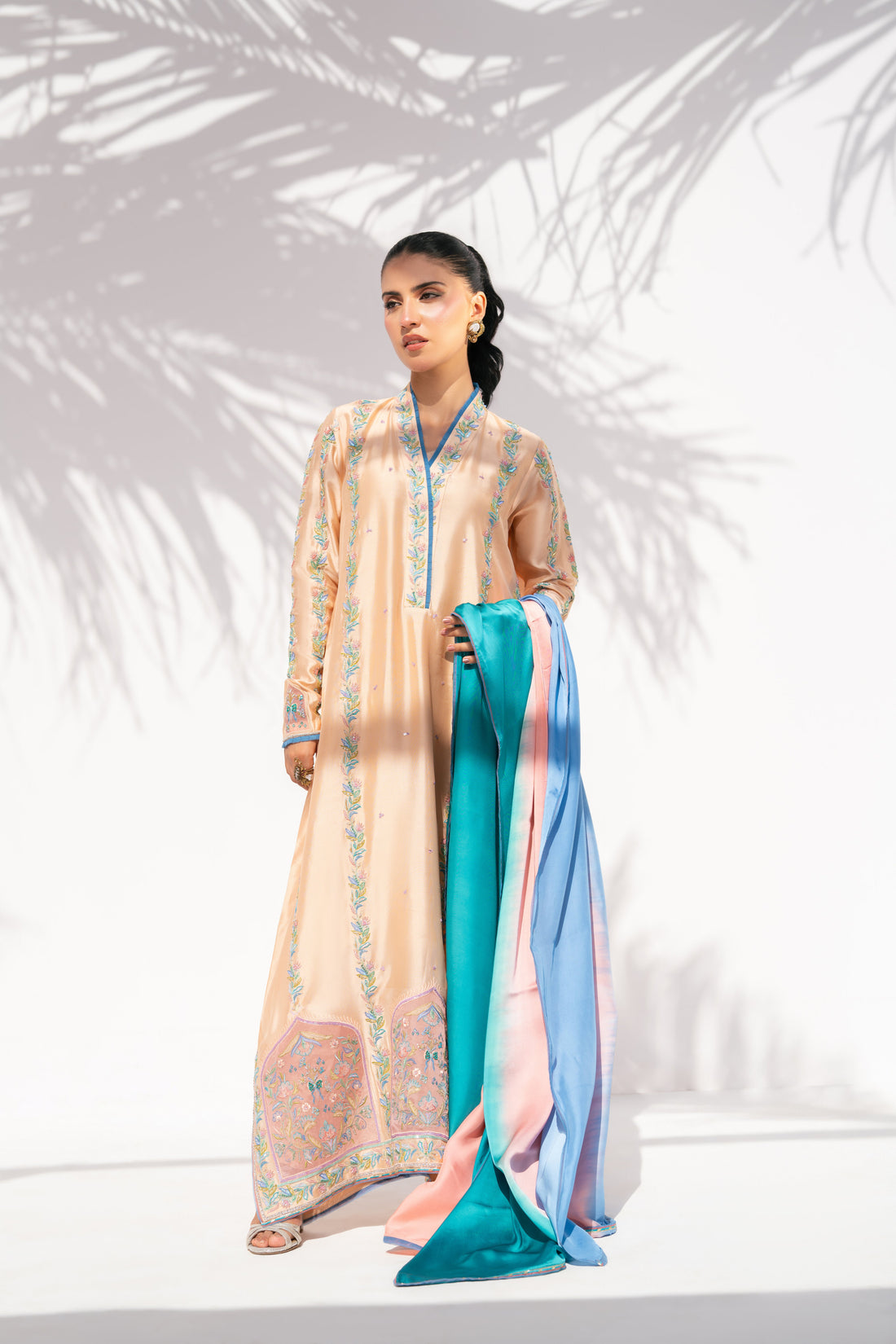 Coral Drizzle embroidered kaftan in sheesha silk by La Soie — the right weight and warmth for UK winter indoor occasions