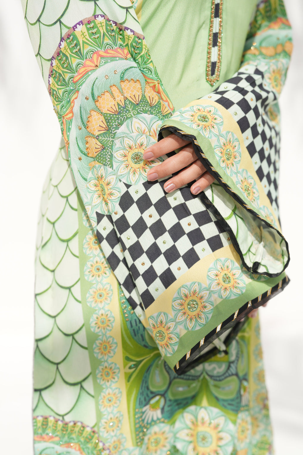 Hem detail in soft green of Aurora Vines