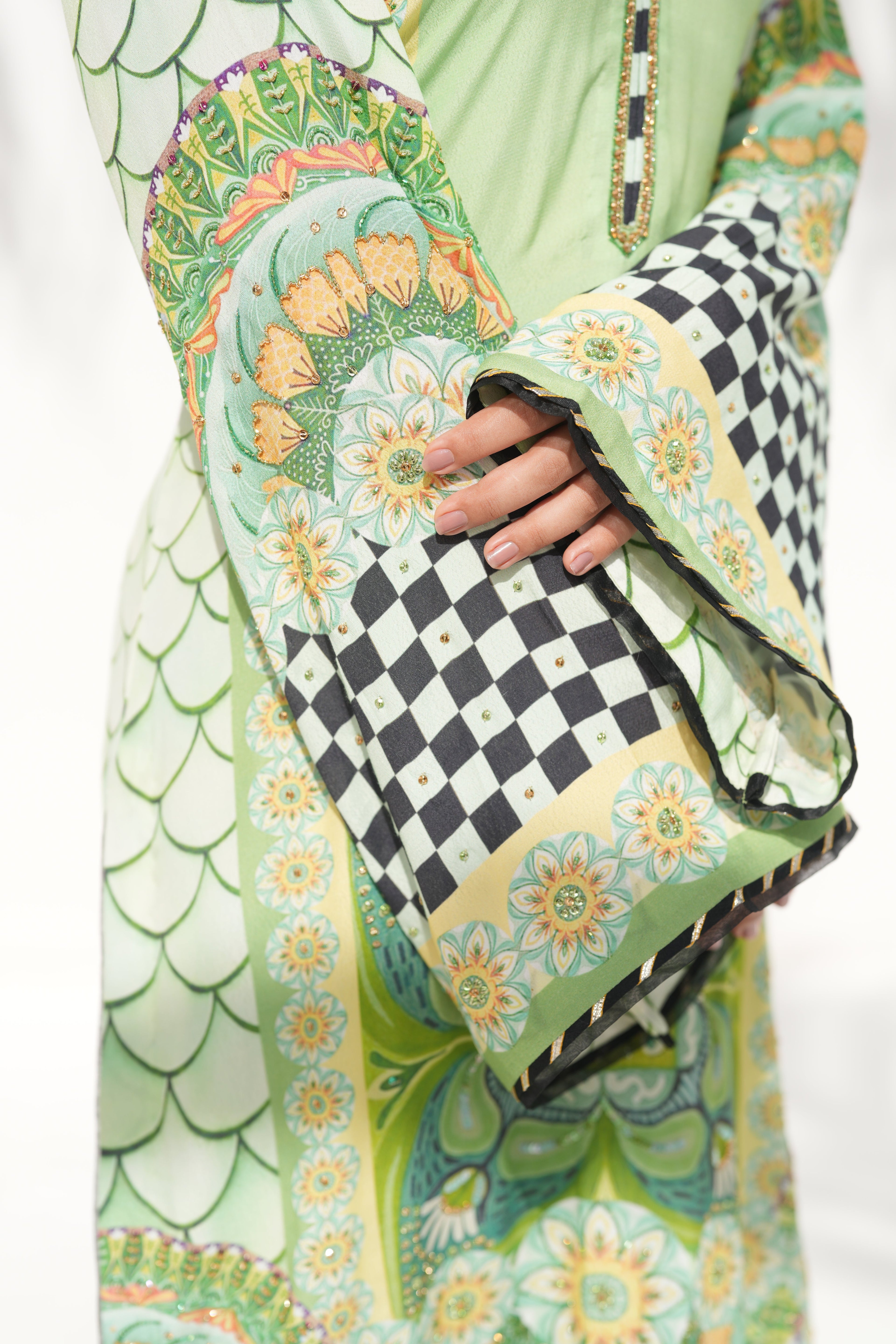 Hem detail in soft green of Aurora Vines