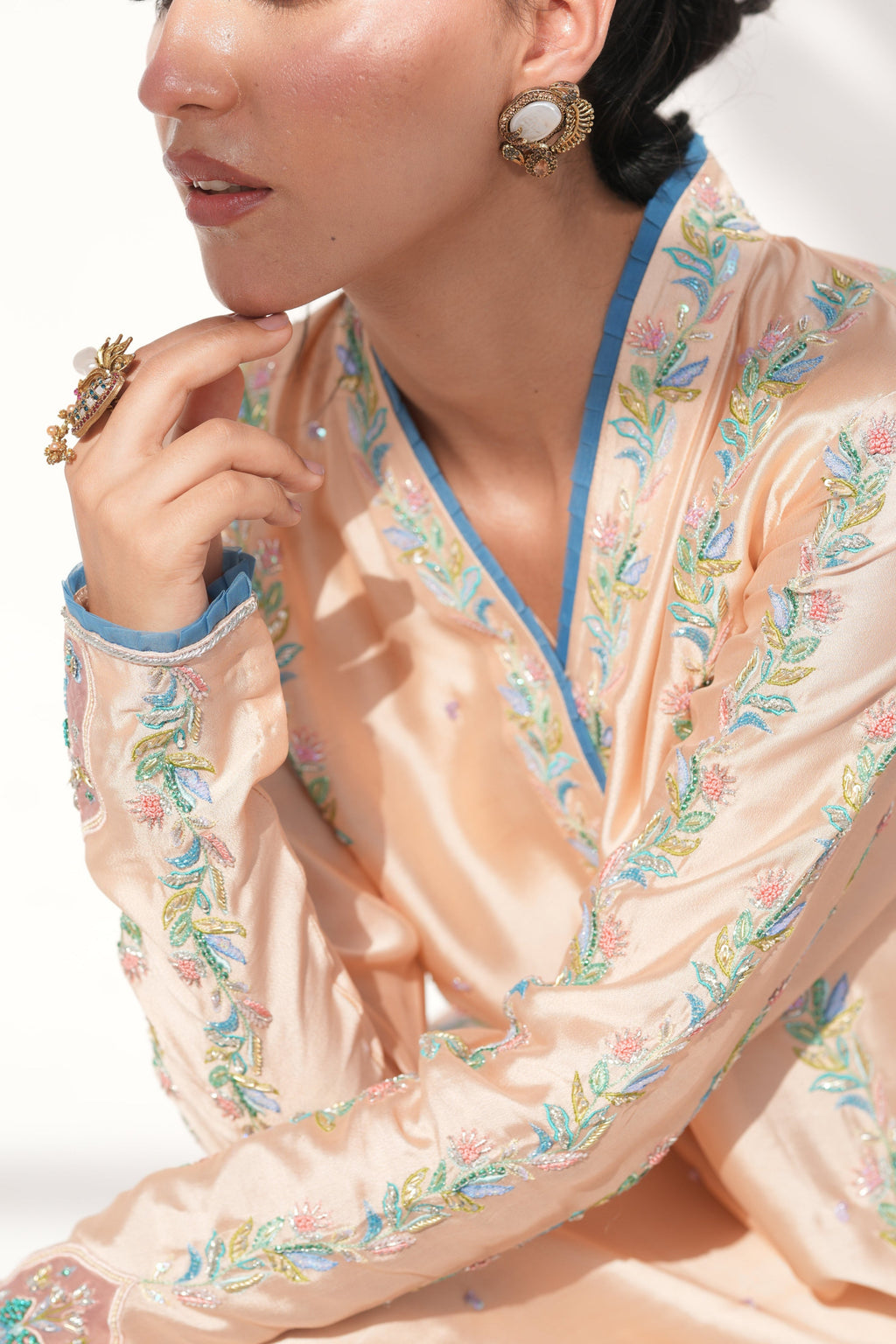 Detail of hand-embellishment on neckline of Coral Drizzle	