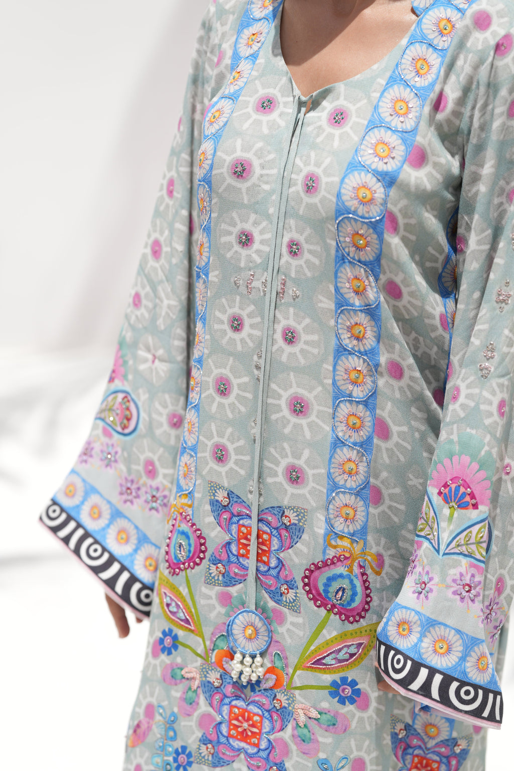 Detail of hand-embellishment on neckline of Blooming Breeze	