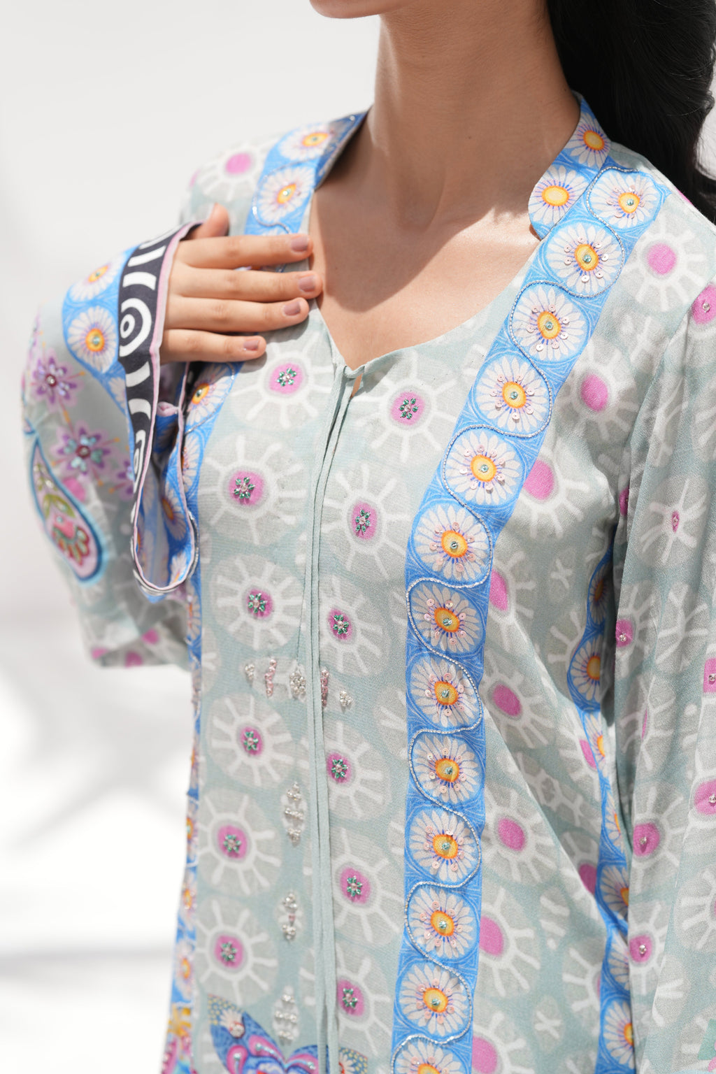 Detail of hand-embellishment on neckline of Blooming Breeze	