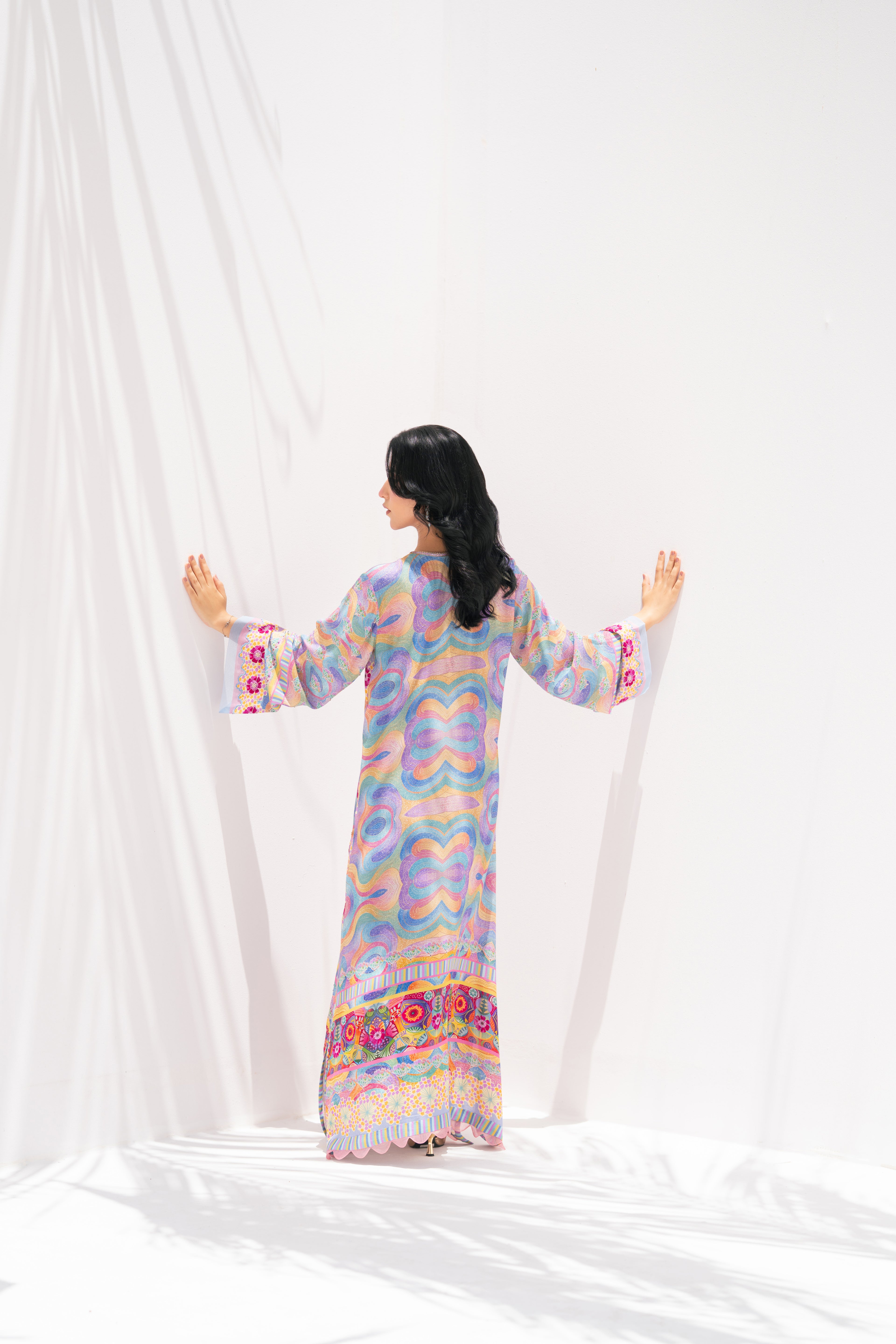 Chroma Bloom back view showing kaftan silhouette	