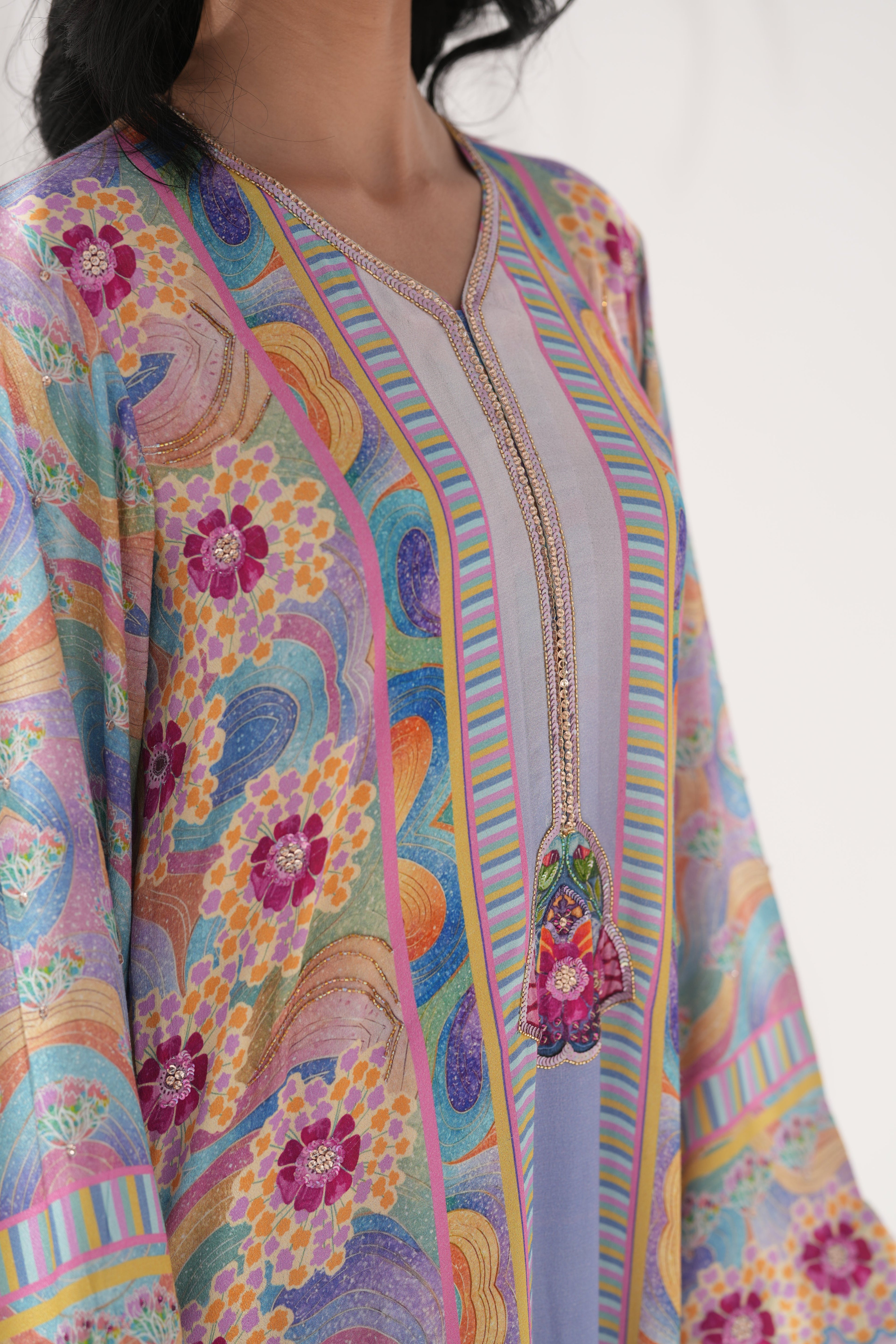 Detail of hand-embellishment on neckline of Chroma Bloom	