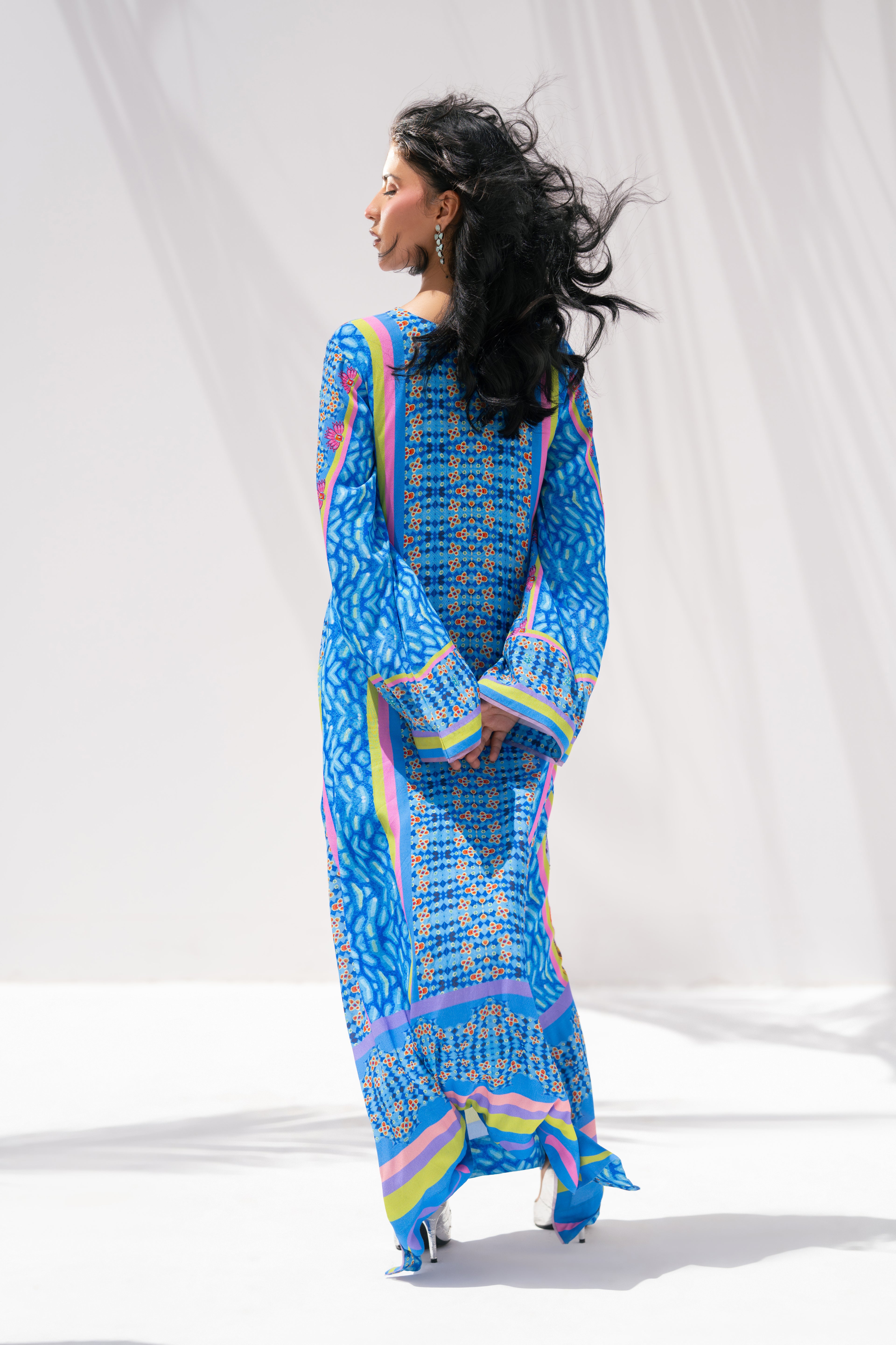 Nova Garden back view showing kaftan silhouette	