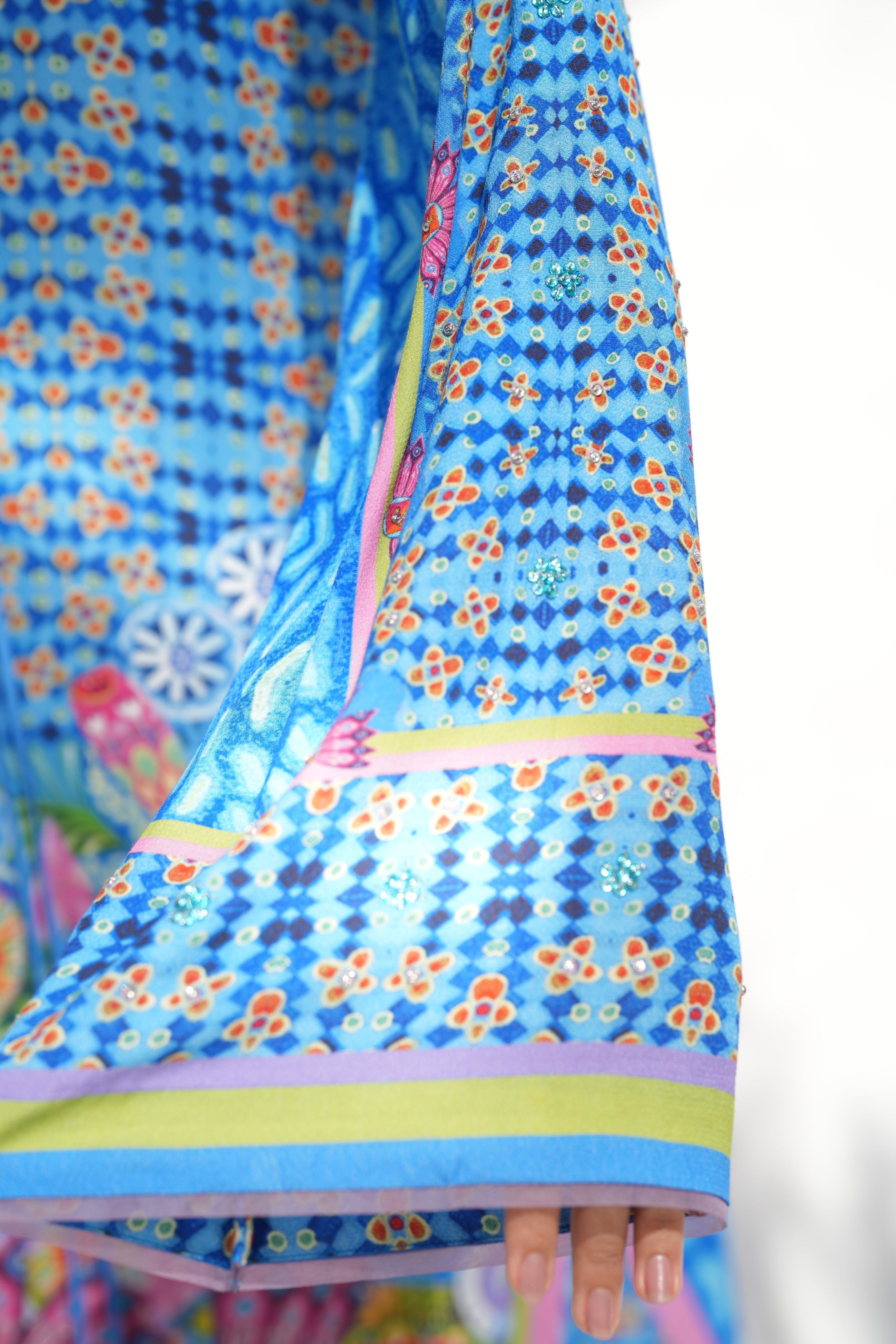 Hem detail in vivid floral of Nova Garden	
