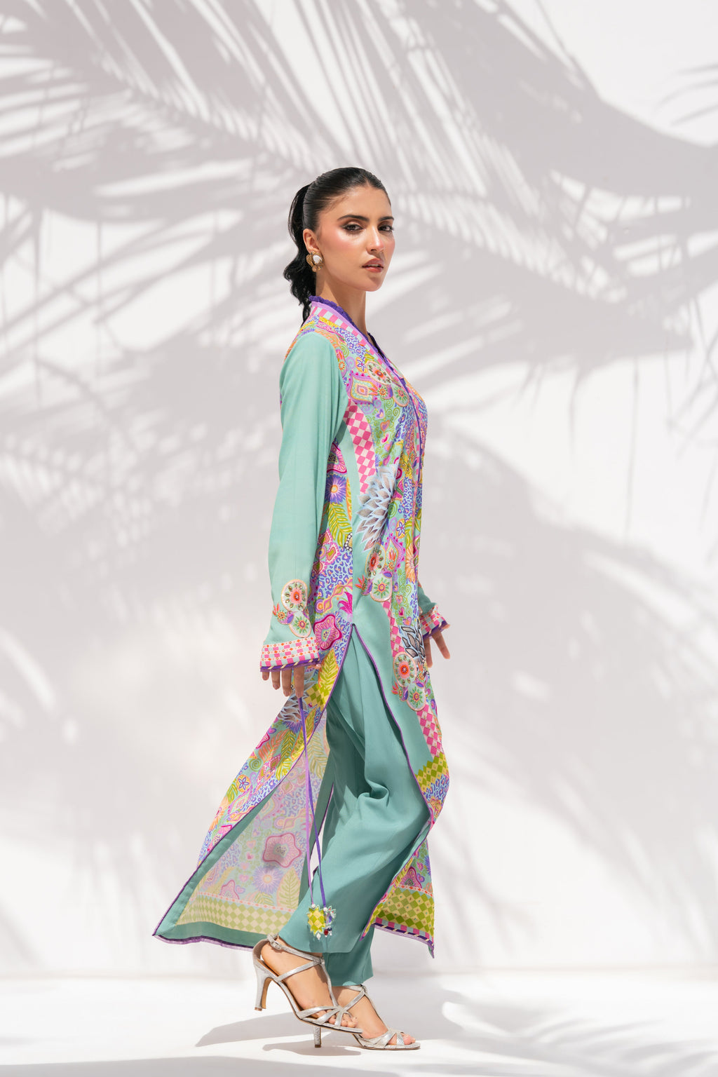 Model walking in Prism Meadows, full length, La Soie