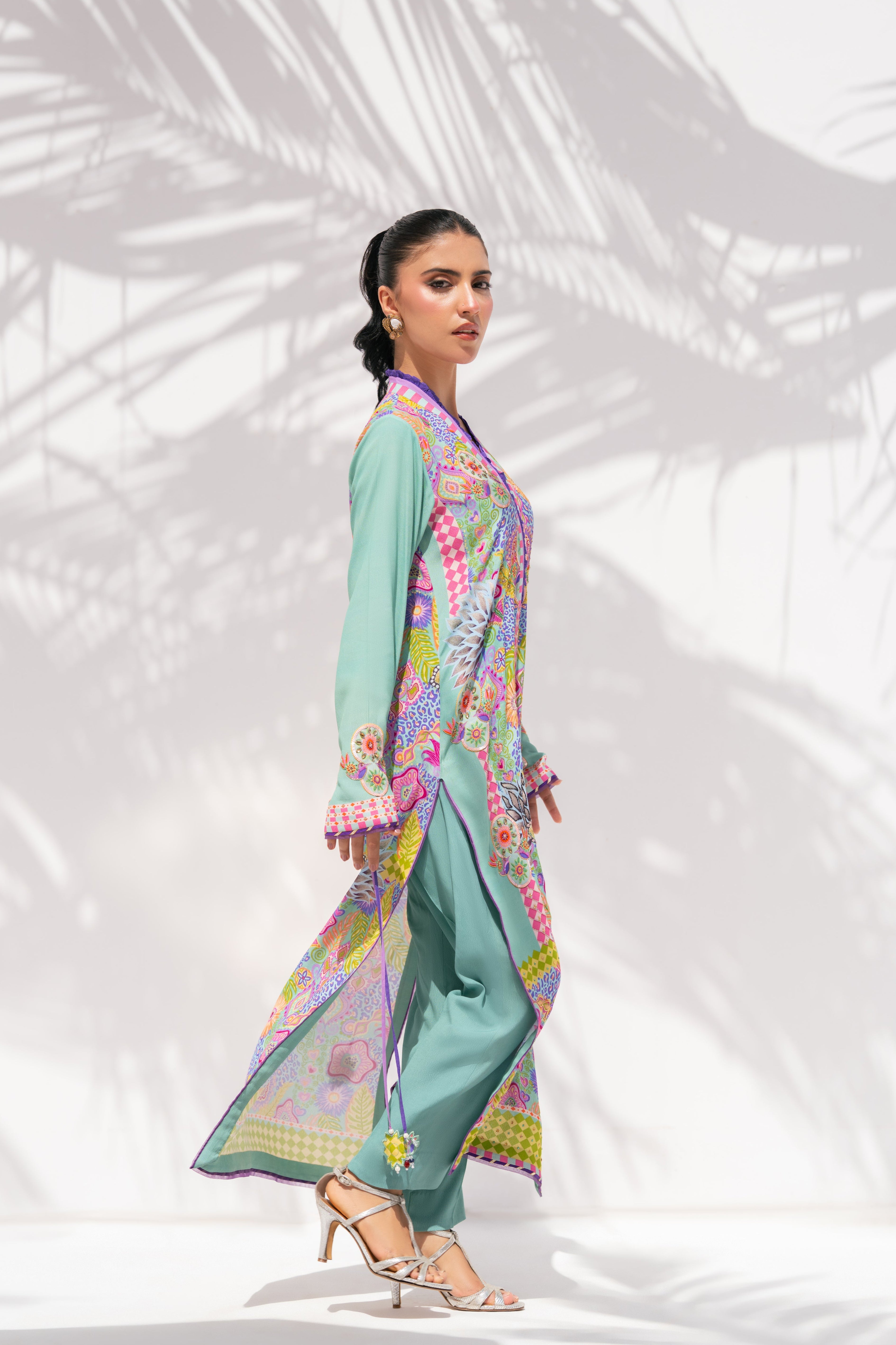 Model walking in Prism Meadows, full length, La Soie