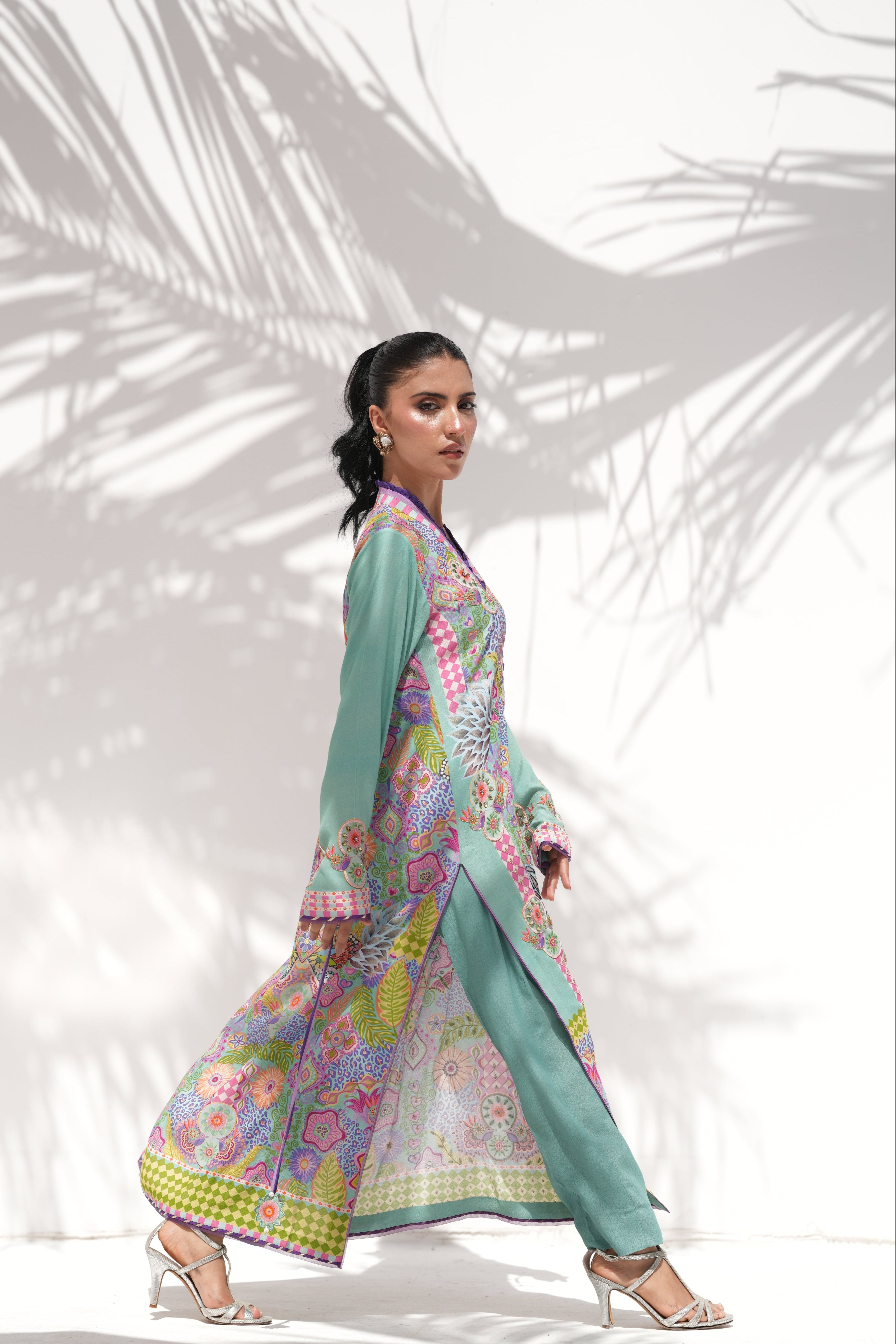 Model walking in Prism Meadows, full length, La Soie