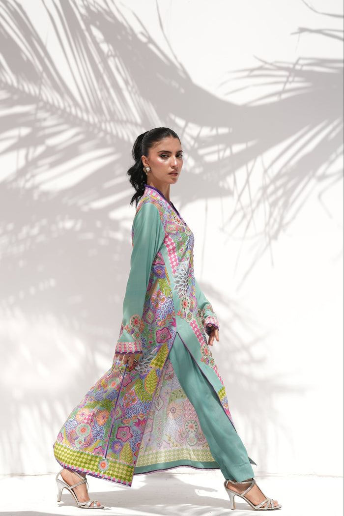 Model walking in Prism Meadows, full length, La Soie