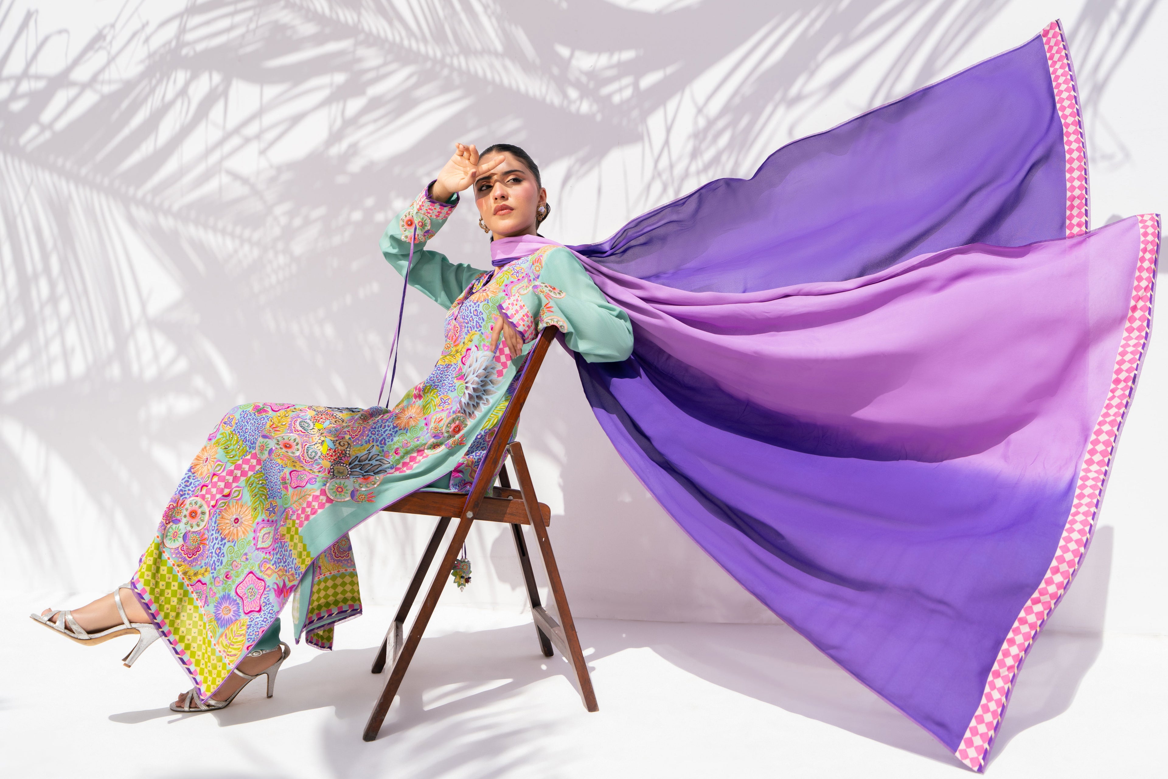 Prism Meadows back view showing dupatta drape and silhouette	